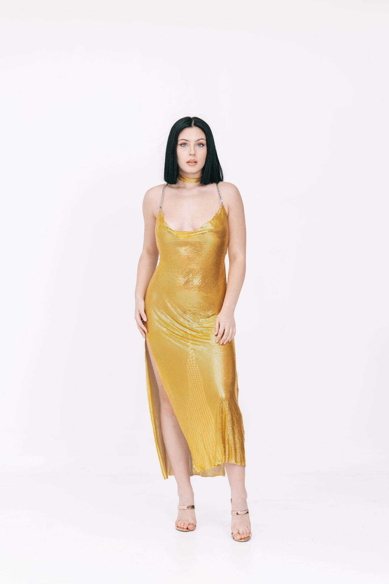 Long backless dress in gold metal mesh